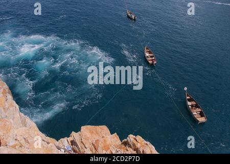 ACAPULCO, MEXICO - AUGUST 24: A vintage boat is seen floating on the seashore on August 24, 2020 in Acapulco, Mexico. Credit: Ricardo Castelan Cruz / Eyepix Group / The Photo Access Stock Photo