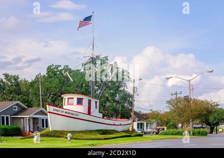 The Spirit of Morgan City shrimp boat monument stands in the median on Brashear Avenue, Aug. 25, 2020, in Morgan City, Louisiana. Stock Photo