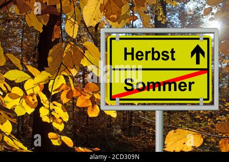 Road sign, end of summer and beginning of autumn, sommer, herbst Stock Photo