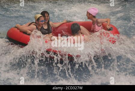 Citizens enjoy water and various aquatic activities to relieve from scorching summer heat as the Nantong Water Park opens to the tourists, Nantong cit Stock Photo