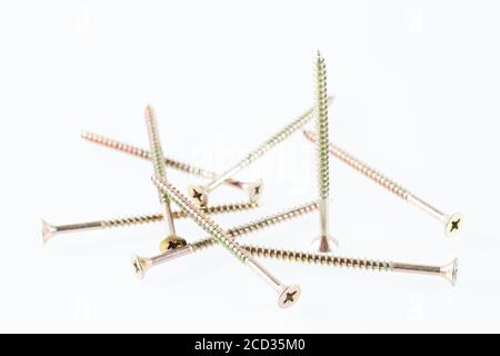 Screws still life large self tapping screws on white background. Stock Photo