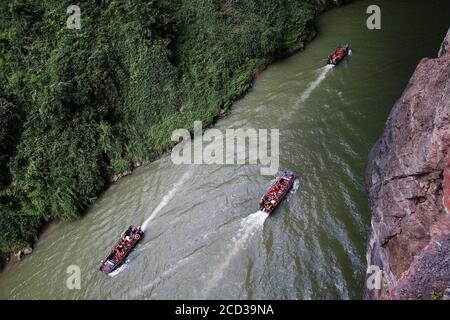 Chongqing, Chongqing, China. 26th Aug, 2020.The Puhua Subsurface river in Zhuoshui Scenic Area, Qianjiang District, Chongqing is about 2 kilometers long and 5 meters at its narrowest. It is composed of the subsurface river, karst caves, canyons and 3 natural Bridges over water. The temperature in the subsurface river keeps a constant temperature of 22Ã¢''Æ' all year round, making it a good place for people to escape from heat and get cool. Credit: ZUMA Press, Inc./Alamy Live News Stock Photo