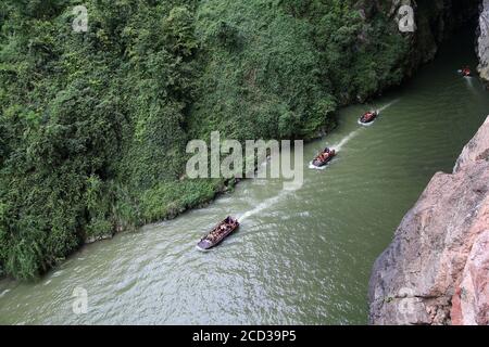 Chongqing, Chongqing, China. 26th Aug, 2020.The Puhua Subsurface river in Zhuoshui Scenic Area, Qianjiang District, Chongqing is about 2 kilometers long and 5 meters at its narrowest. It is composed of the subsurface river, karst caves, canyons and 3 natural Bridges over water. The temperature in the subsurface river keeps a constant temperature of 22Ã¢''Æ' all year round, making it a good place for people to escape from heat and get cool. Credit: ZUMA Press, Inc./Alamy Live News Stock Photo