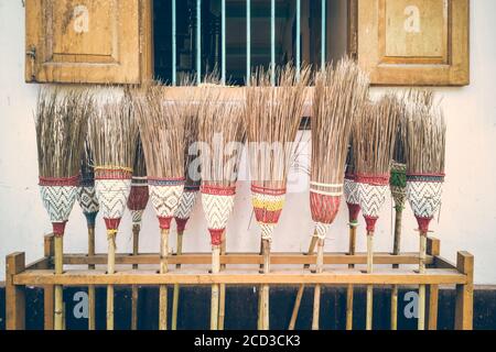 Bamboo brooms at Mahagandhayon Monastery, Amarapura, Mandalay, Burma, Myanmar Stock Photo