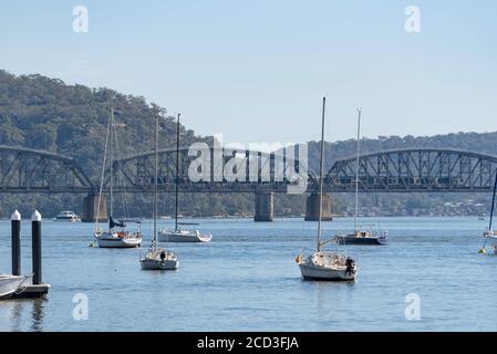 Viewed from Dangar Island, the Hawkesbury River Rail bridge is a steel eight truss railway bridge completed in 1946, it is NSW's longest rail bridge Stock Photo