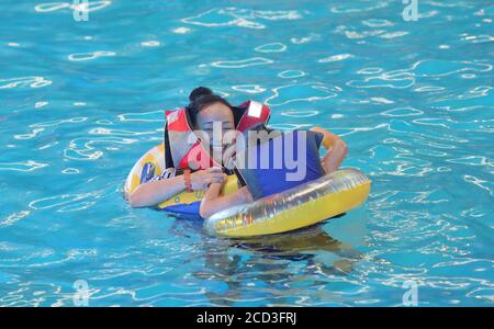 Citizens enjoy water and various aquatic activities to relieve from scorching summer heat as the Nantong Water Park opens to the tourists, Nantong cit Stock Photo