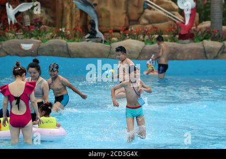 Citizens enjoy water and various aquatic activities to relieve from scorching summer heat as the Nantong Water Park opens to the tourists, Nantong cit Stock Photo