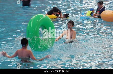 Citizens enjoy water and various aquatic activities to relieve from scorching summer heat as the Nantong Water Park opens to the tourists, Nantong cit Stock Photo