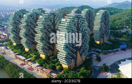 An aerial view of the Beauty Crown Hotel, which looks like nine enormous trees from the computer game Minecraft, drawing attention of tourists and sit Stock Photo