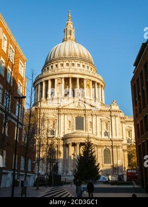 Iconic London landmark, the dome of St Paul's Cathedral viewed from the south side with blue sky