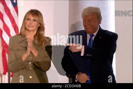 In this image from the Republican National Convention video feed, United States President Donald J. Trump gestures towards first lady Melania Trump after she made remarks during the second day of the convention on Tuesday, August 25, 2020.Credit: Republican National Convention via CNP /MediaPunch Stock Photo