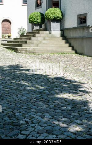 Colorful old cobblestone pavement, stone road pattern Stock Photo