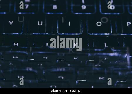 Backlit keyboard of an laptop in the dark Stock Photo