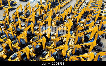 An aerial view of arrays of excavators at a factory of Chinese multinational heavy equipment manufacturing company Sany Heavy Industry Co., Ltd. in Li Stock Photo
