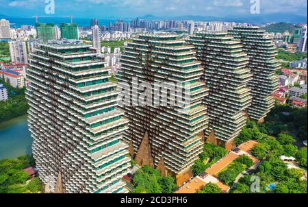 An aerial view of the Beauty Crown Hotel, which looks like nine enormous trees from the computer game Minecraft, drawing attention of tourists and sit Stock Photo