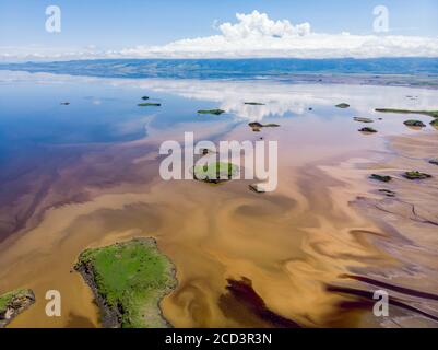 Aerial view on a Picturesque Coastline of Lake Natron in the Great Rift Valley, between Kenya and Tanzania. In the dry season the lake is 80% covered Stock Photo