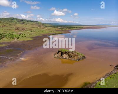 Aerial view on a Picturesque Coastline of Lake Natron in the Great Rift Valley, between Kenya and Tanzania. In the dry season the lake is 80% covered Stock Photo