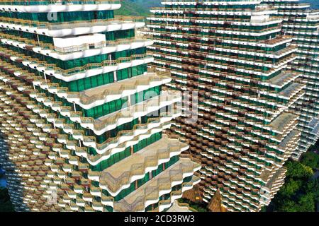 An aerial view of the Beauty Crown Hotel, which looks like nine enormous trees from the computer game Minecraft, drawing attention of tourists and sit Stock Photo