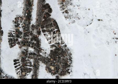 Foot prints in snow Stock Photo