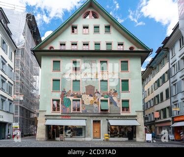 Lucerne Switzerland , 29 June 2020 : Facade of an ancient colourful painted house on Weinmarkt square in Lucerne old town Switzerland Stock Photo
