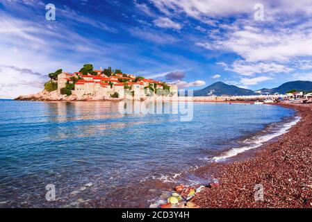 Sveti Stefan Island in Budva, Montenegro, charming island the blue Adriatic Sea. Stock Photo