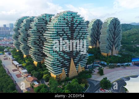 An aerial view of the Beauty Crown Hotel, which looks like nine enormous trees from the computer game Minecraft, drawing attention of tourists and sit Stock Photo