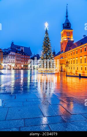 Warsaw, Poland - Christmas Tree in illuminated Castle Square, polish Old Town capital. Stock Photo