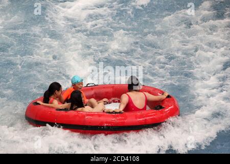 Citizens enjoy water and various aquatic activities to relieve from scorching summer heat as the Nantong Water Park opens to the tourists, Nantong cit Stock Photo