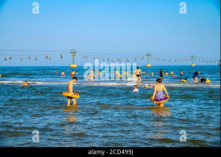 People enjoy the view of Beidai River as people flock to Beidaihe Scenic Spot as summer resort in Qinhuangdao city, north China's Hebei province, 24 J Stock Photo