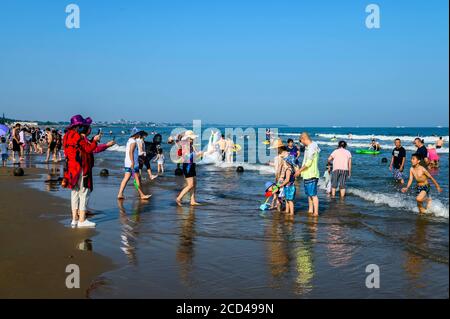 People enjoy the view of Beidai River as people flock to Beidaihe Scenic Spot as summer resort in Qinhuangdao city, north China's Hebei province, 24 J Stock Photo