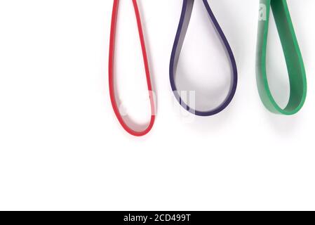 Closeup of colorful resistance bands isolated on a white background