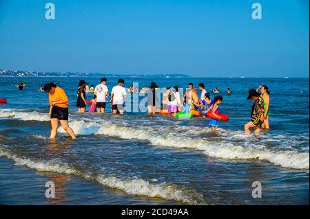 People enjoy the view of Beidai River as people flock to Beidaihe Scenic Spot as summer resort in Qinhuangdao city, north China's Hebei province, 24 J Stock Photo