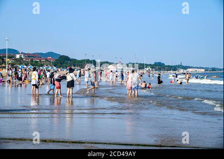 People enjoy the view of Beidai River as people flock to Beidaihe Scenic Spot as summer resort in Qinhuangdao city, north China's Hebei province, 24 J Stock Photo