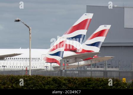 Heathrow Airport, London, UK. 26 August 2020. British Airways aircraft parked at Heathrow Airport. COVID-19 pandemic has seen the airline industry slump worldwide, with approx 11% of passengers at Heathrow in July 2020 compared with the same month in 2019, and approx 25% of air traffic movements at Heathrow in July 2020 compared with July 2019. Credit: Malcolm Park/Alamy Live News. Stock Photo