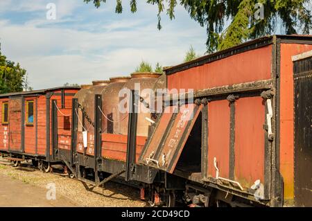 WENECJA, POLAND - Aug 20, 2020: Brown old exposition wagons at a outdoor locomotive museum Stock Photo