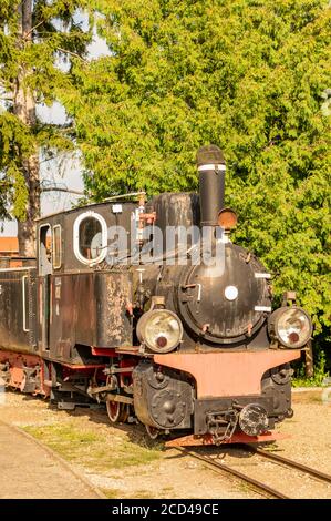 WENECJA, POLAND - Aug 20, 2020: Old historic exposition steam locomotive at a outdoor museum Stock Photo