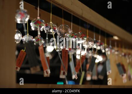 Tokyo, Japan. 26th Aug, 2020. Wind chimes are seen at an exhibition near the Tokyo Station in Tokyo, Japan, Aug. 26, 2020. Over 2,000 wind chimes are on display during the exhibition that goes from Aug. 21 to Aug. 28. Credit: Du Xiaoyi/Xinhua/Alamy Live News Stock Photo