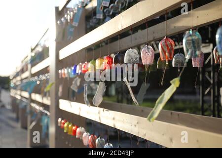 Tokyo, Japan. 26th Aug, 2020. Wind chimes are seen at an exhibition near the Tokyo Station in Tokyo, Japan, Aug. 26, 2020. Over 2,000 wind chimes are on display during the exhibition that goes from Aug. 21 to Aug. 28. Credit: Du Xiaoyi/Xinhua/Alamy Live News Stock Photo