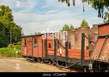 WENECJA, POLAND - Aug 20, 2020: Brown old exposition wagons at a outdoor locomotive museum Stock Photo