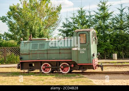 WENECJA, POLAND - Aug 20, 2020: Old historic exposition steam locomotive at a outdoor museum Stock Photo