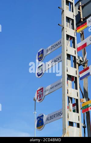 WENECJA, POLAND - Aug 20, 2020: Signs showing different flags at the locomotive museum Stock Photo