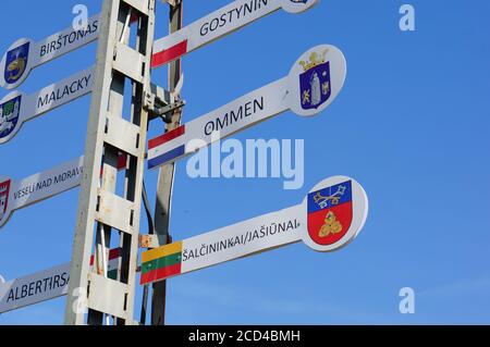 WENECJA, POLAND - Aug 20, 2020: Signs showing different flags at the locomotive museum Stock Photo