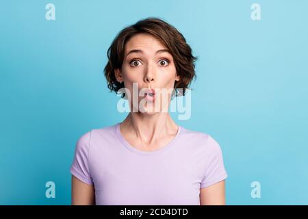Portrait of astonished girl hear unbelievable novelty impressed stare stupor wear casual style outfit isolated over blue color background Stock Photo