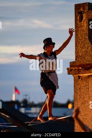 Prague, Czech Republic. 25th Aug, 2020. An acrobat performs during the filming of Andersen's fairy tale The Shepherdess and the Chimney Sweep, on August 25, 2020, on the roofs of the Lucerna Palace in Prague, Czech Republic. Credit: Roman Vondrous/CTK Photo/Alamy Live News Stock Photo