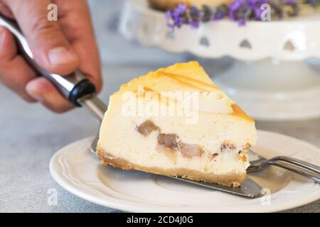 Caramel apple pear cheesecake.  Autumn dessert. Stock Photo