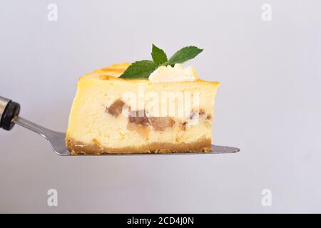 Caramel apple pear cheesecake.  Autumn dessert. Stock Photo