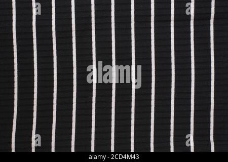 Black and white striped knitted fabric. Close up. Fashionable concept Stock Photo