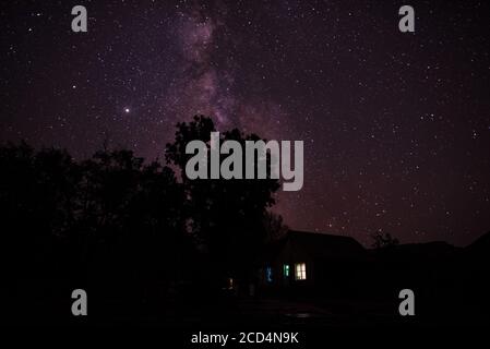 Starry skies in Capitol Reef National Park, Utah, USA.  Dark skies are vital to viewing the stars and heavens.  Reducing light pollution is a priority. Stock Photo