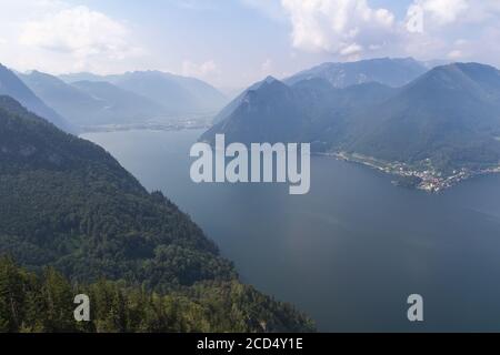 Traunsee lake with alps mountain and city Traunkirchen from hill Kleiner Schonberg. Austria landscape Stock Photo