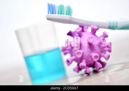 Coronavirus miniature, toothbrush and mouthwash